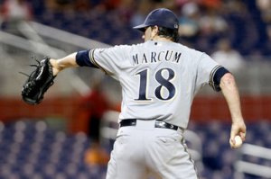 SP Shaun Marcum, now with the Mets, has to improve on last year's 7-4 record as well as his elbow issues. Marc Serota / Getty Images
